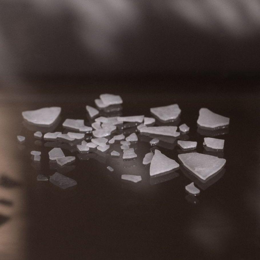Zechstein flakes on metal in the sunlight